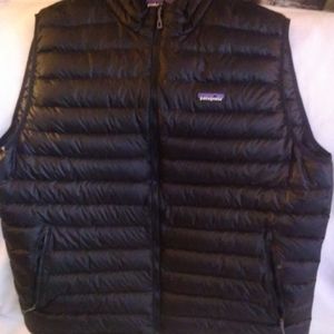 Patagonia down puffer vest with pack away pocket. Men's xxl